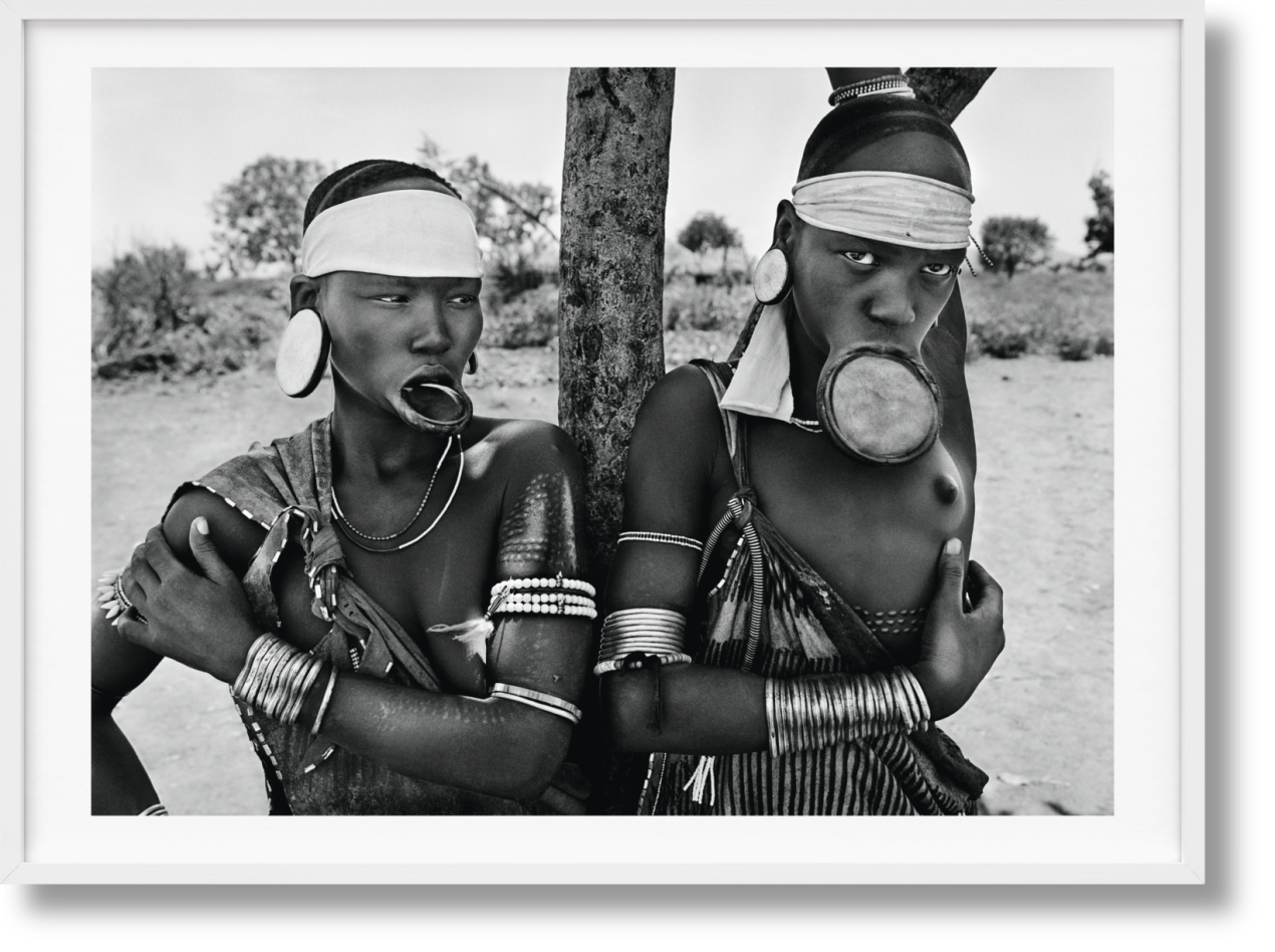 Sebastião Salgado. GENESIS, Art Edition No. 1–100 ‘Two Mursi Women, Omo Valley, Ethiopia’ - Image 1 of 12