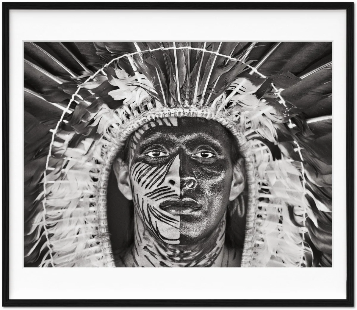 Sebastião Salgado. Amazônia. Art Edition No. 1–100 ‘Adão Yawanawá in a headdress of eagle feathers’